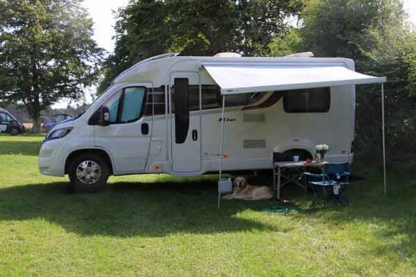 Brackenstraveltails relaxing by the motorhome in Scotland