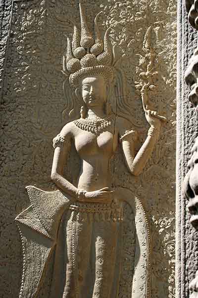 Celestial beings: Apsara carved in stone on The walls of The Angkor Wat.